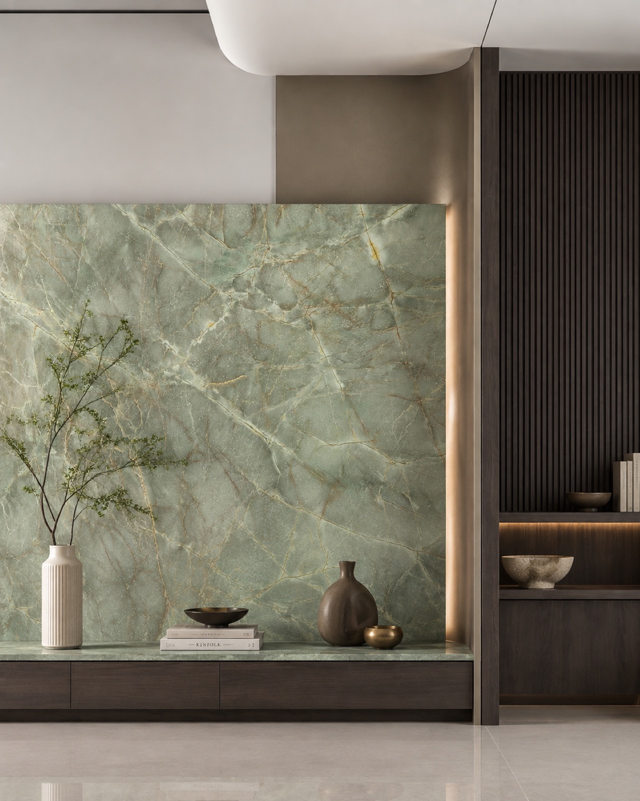 A green quartzite feature wall with gold veining behind a console
