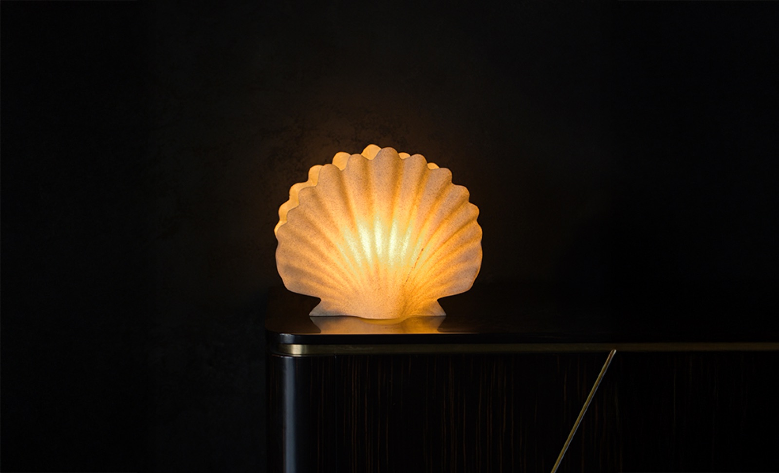 Artisanal lamps casting a warm, hand made light